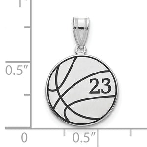 White basketball number pendant against an inch ruler, about half an inch across