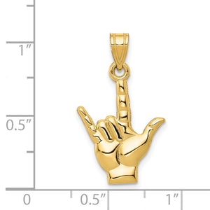 14K gold I Love You hand pendant against an inch ruler for scale