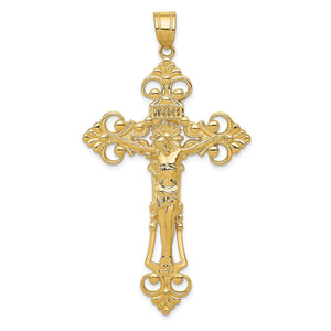 Front view of the gold INRI crucifix pendant showing the corpus and the fleur de lis detail on each arm