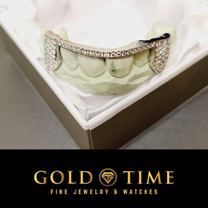 Bust down honeycomb moissanite six piece grillz on a mold inside its presentation box