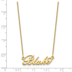 Yellow gold cursive script name necklace hanging on its cable chain