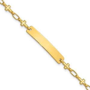 Gold plated cross link ID bracelet at an angle showing the alternating cross and oval links