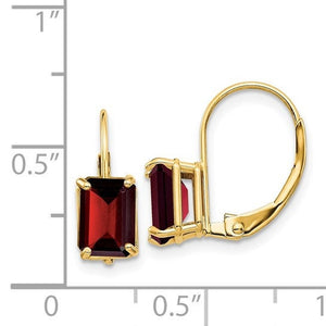 14k gold garnet emerald-cut leverback earring beside a ruler showing it is under one inch tall