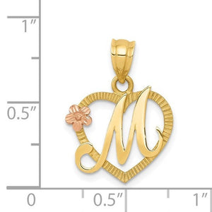 Script M heart initial pendant against a half inch scale, about 16mm wide