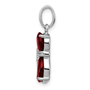 Side profile of the sterling silver cat pendant set with garnet