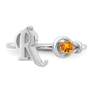 Sterling silver initial ring with an orange November birthstone, shown from the front