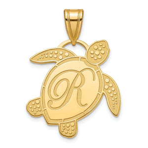 Yellow gold sea turtle pendant with a script initial R engraved on the polished shell and textured flippers