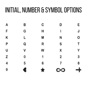 Chart of initial necklace options: letters A to Z, numbers 0 to 9, heart, star, infinity, and cross symbols