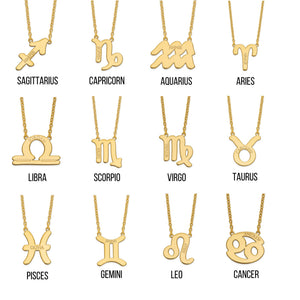 Twelve yellow gold zodiac pendant necklaces labeled with their sign names