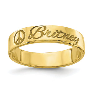 Yellow gold flat band engraved with a name in script beside a small peace sign symbol