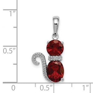 Size chart showing the garnet cat pendant beside a ruler, about three quarters of an inch