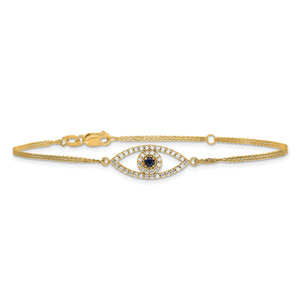 14K yellow gold evil eye bracelet laid straight, showing the diamond eye and sapphire center