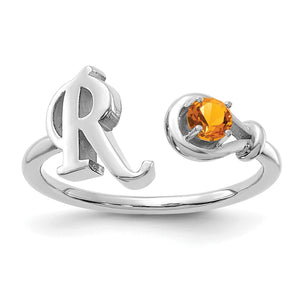 Sterling silver initial birthstone ring with the stone set, shown from above