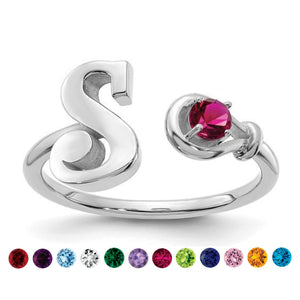 Sterling silver initial birthstone ring with a red stone, shown with the twelve birthstone color options