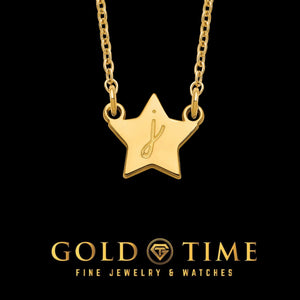 Star initial necklace shown in 14K gold