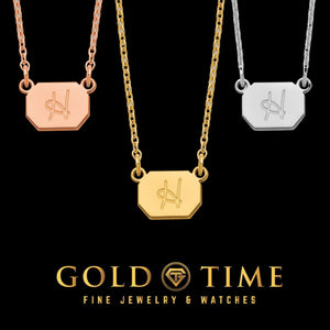 Custom initial necklaces in rose gold, yellow gold and silver displayed together on black with the Gold Time logo
