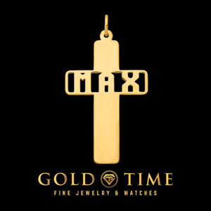 Yellow gold personalized cross pendant with the name MAX cut through the center, on a black background with Gold Time branding