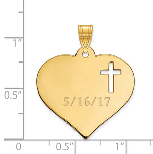 Gold plated heart pendant with cross cutout beside a ruler, about 23mm by 24mm