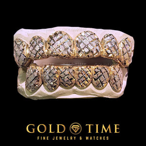 Top and bottom two-tone trillion cut diamond dust grillz on molds