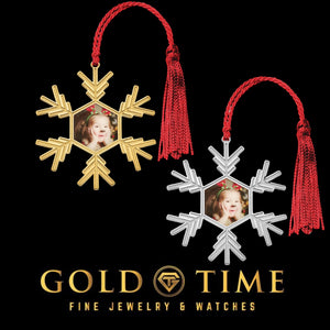 Gold and silver snowflake photo ornaments with red tassels, each holding a child's photo, on a black Gold Time card