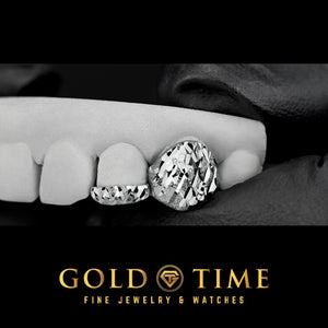 Angled view of the silver 4 piece grillz showing the trillion cut facets on the incisor tips