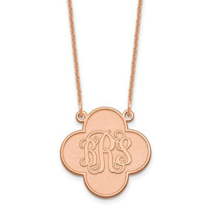 Rose gold clover shaped monogram pendant engraved with three script initials