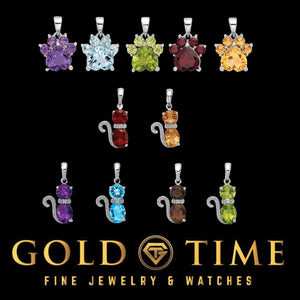 Group of sterling silver cat and paw gemstone pendants in several stone colors on a black Gold Time card