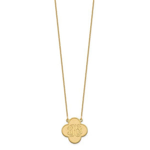 Yellow gold clover monogram necklace shown full length with the pendant centered on the chain