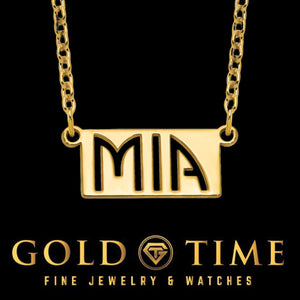 Gold plated bar name necklace with the name Mia cut out on a cable chain