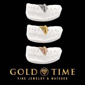 Fang and diagonal incisor grillz shown in silver, yellow gold, and rose gold on dental molds