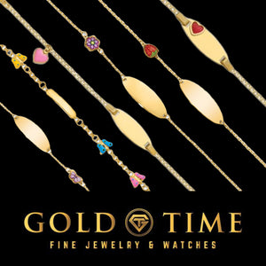 14k gold girls enamel ID bracelets with butterfly, heart, strawberry and flower charms on a black background with Gold Time branding