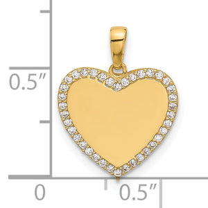 14k gold cubic zirconia heart pendant beside a ruler showing it is about three quarters of an inch tall