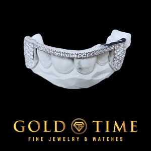 Six piece grillz with bust down honeycomb moissanite canines and a moissanite tip row across the fronts, on a dental mold