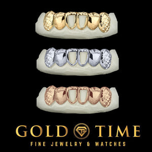 Custom 6 piece trillion cut open face grillz in yellow, white, and rose gold