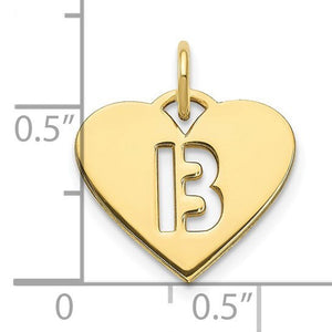 Yellow gold heart pendant with a cut out letter B next to a ruler showing it is about half an inch wide