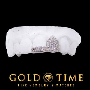 Double cap grill on a top mold with a fully iced bustdown moissanite canine and a double row moissanite incisor tip, Gold Time logo