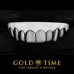 8 piece black rhodium grillz with perm cuts on a mold