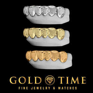 Three 6 piece diamond dust grillz sets in white, rose and yellow gold shown stacked