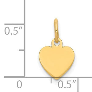 Size chart showing the heart charm beside a ruler, about half an inch