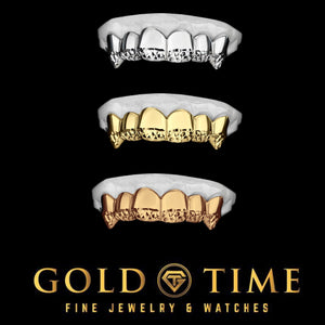 Trillion cut tip fang grillz shown in white, yellow and rose gold on dental models