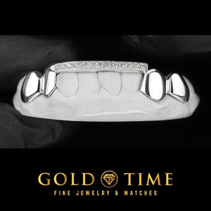 Custom 8 piece white metal grill with solid canines and bicuspids and a moissanite-lined bar across the front incisor tips, Gold Time