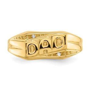 Gold ring with "DAD" and small diamonds on a white background