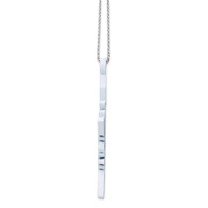 Side profile of the snowflake ornament hanging from its cord