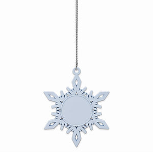 White pewter snowflake ornament hanging from a silver cord