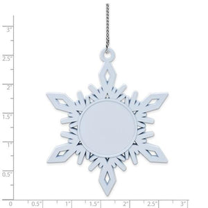 Size chart showing the snowflake ornament beside a ruler, about three inches across