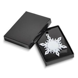 Black Gold Time gift box holding the snowflake ornament