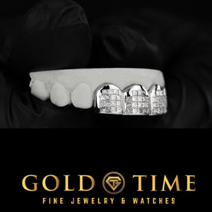 Angled view of the invisible set moissanite grillz showing the squared stone layout across four caps