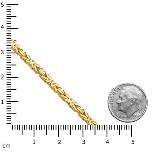 4mm 10K gold Byzantine chain next to a ruler and a dime for scale