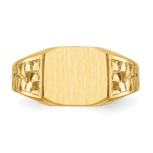 Close up of the brushed rectangular signet face framed by nugget textured gold shoulders