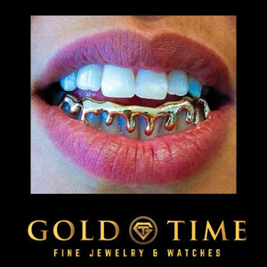Customer wearing custom silver 8 piece drip grillz